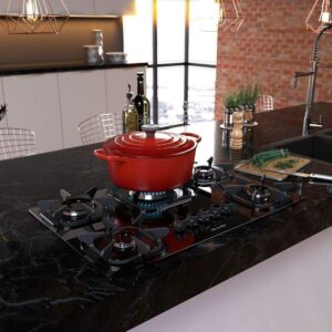 Melhor cooktop 5 bocas com panela vermelha em cima.